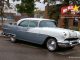 FEBRUARY 2022 1956 PONTIAC LAURENTIAN LINKS A GRANDFATHER WITH HIS GRANDDAUGHTER