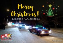 A CHRISTMAS PARADE TURNED INTO A TRIP DOWN SANTA CLAUS LANE IN A 1963 PLYMOUTH